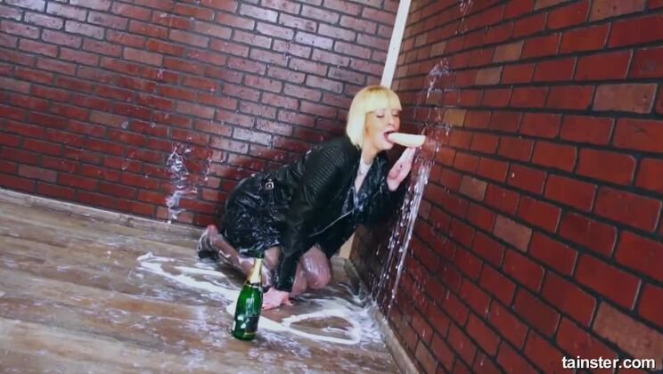 Leather Covered Blonde Gets a Cum Filled Surprise