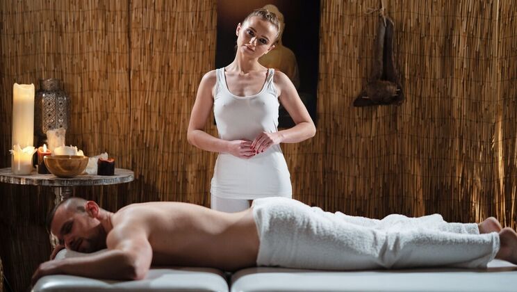 Blonde Masseuse Seduces with Oil and Blowjob